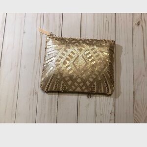 Gold sequin clutch